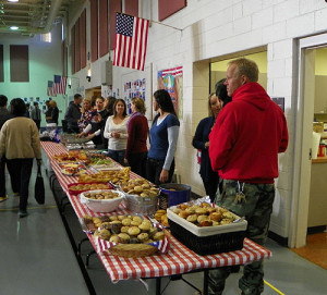 The breakfast table is laden with fresh cooked and prepared goodies.